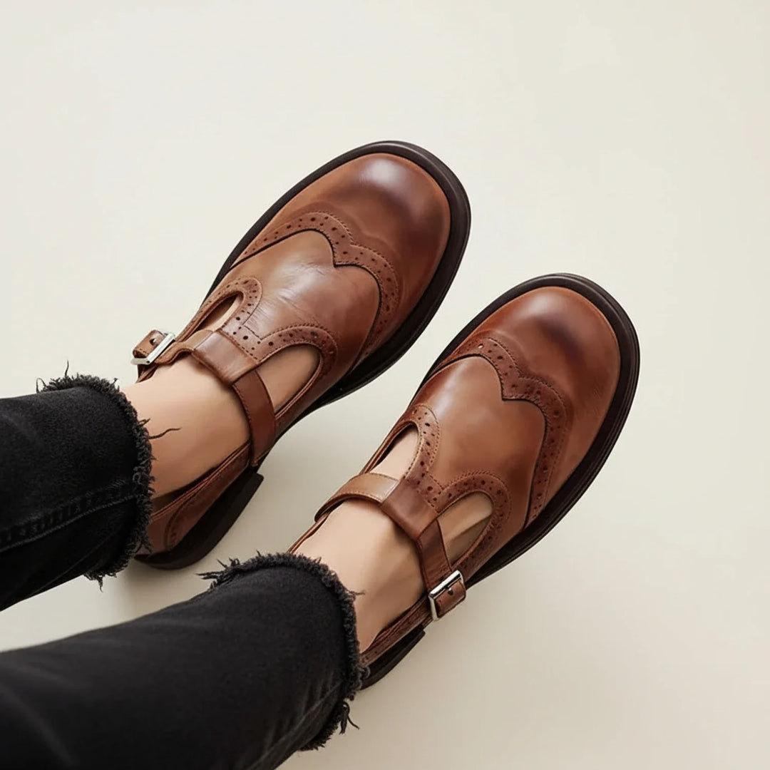 Women's classic black Mary Jane T-strap platform heels with buckle, vintage-inspired design.