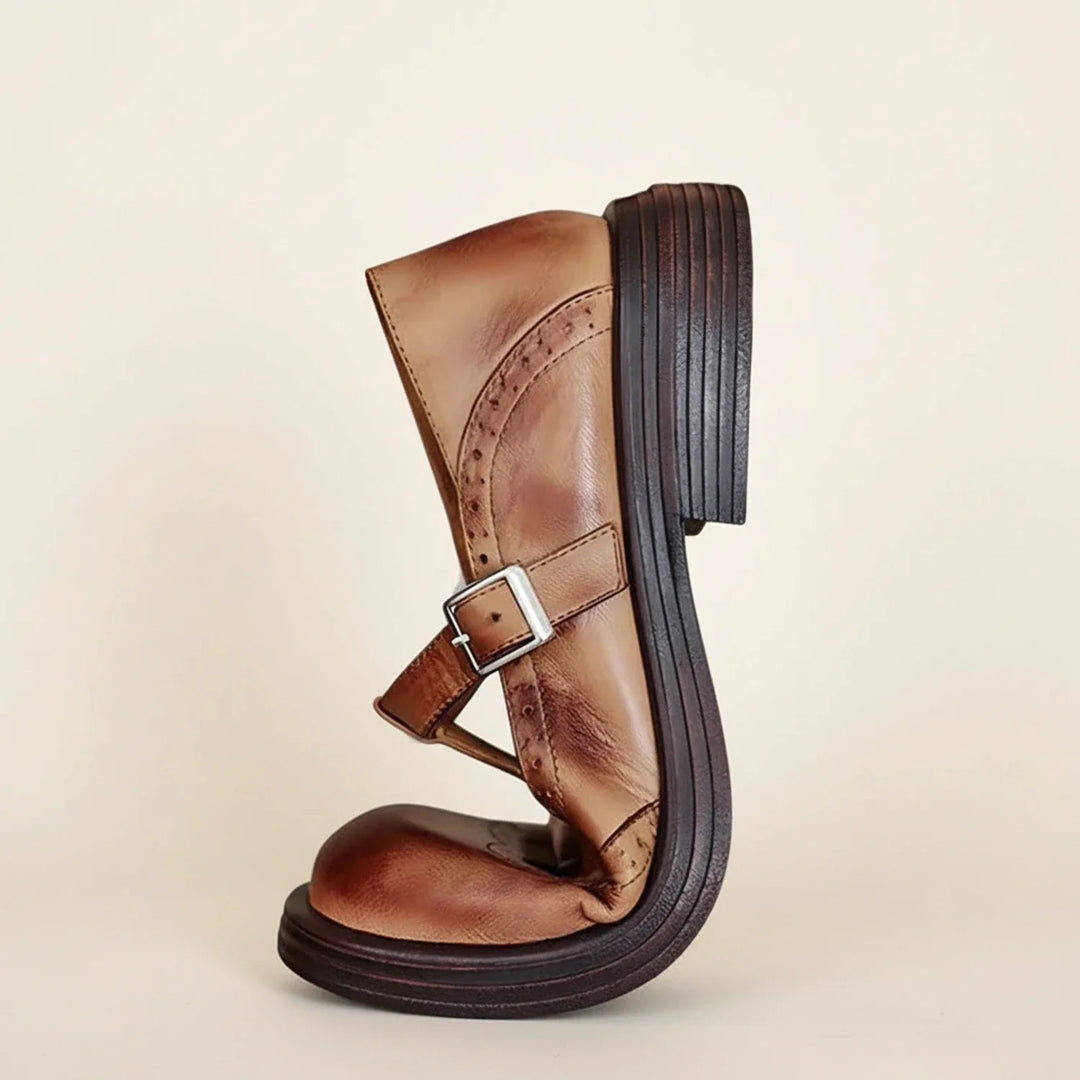 Women's classic Mary Jane T-strap platform shoes featuring buckle closure & lug sole. Perfect for everyday style.
