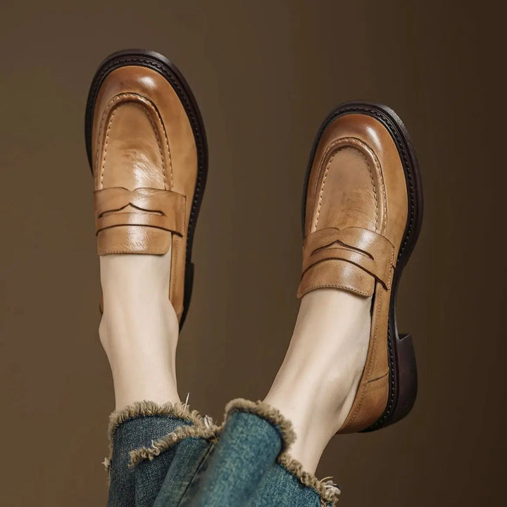 Women's classic brown leather T-strap flats, elegant and comfortable for versatile wear