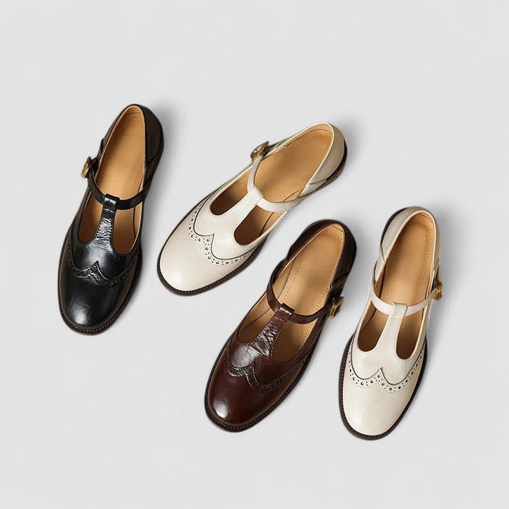 Bottom view of women's classic buckle strap Mary Janes, showing durable sole for versatile wear