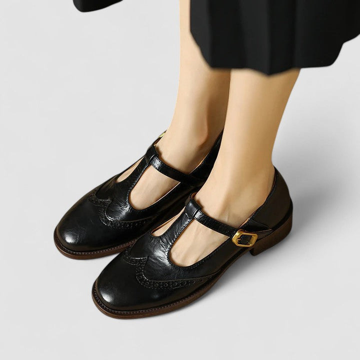 Model wearing black buckle strap Mary Janes with a casual outfit, ideal for spring fashion