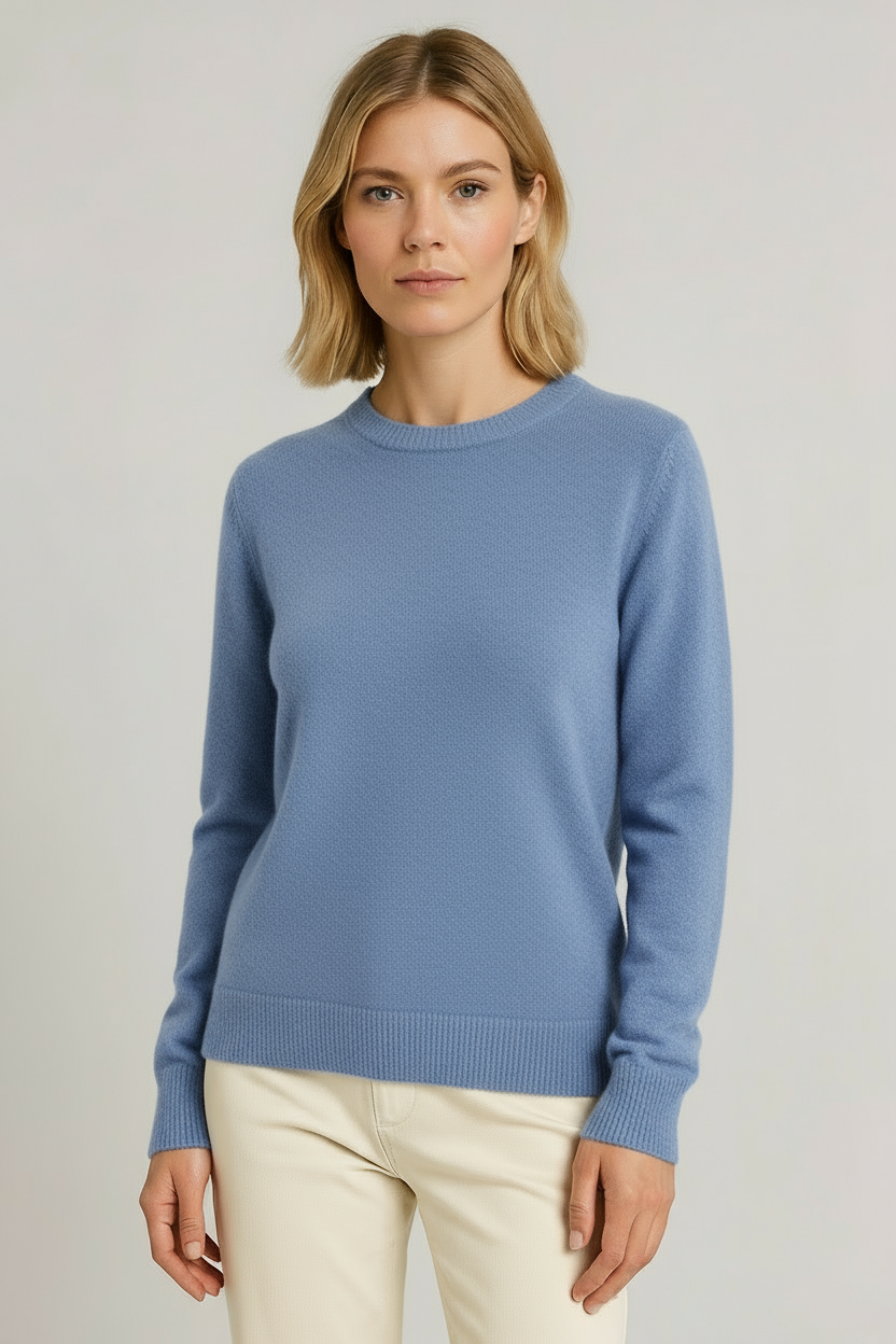 Fashionable women's crew neck long sleeve sweater. An elegant basic top for everyday styling.