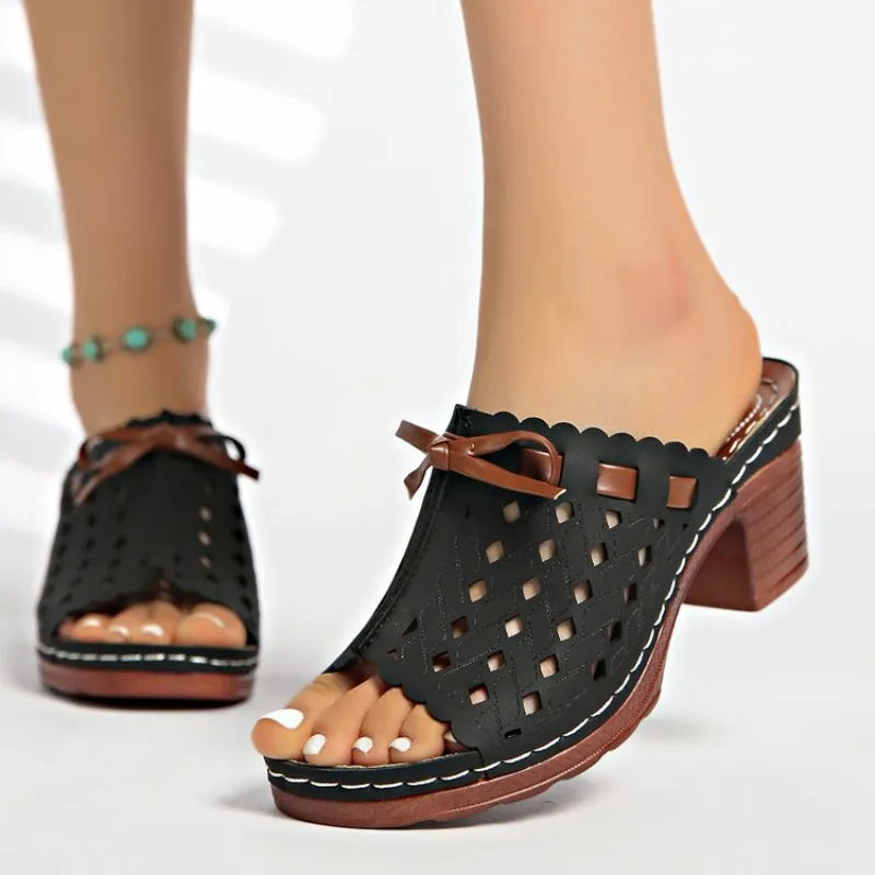 Women's classic cutout block heel mules, perfect for comfortable and fashionable summer wear.