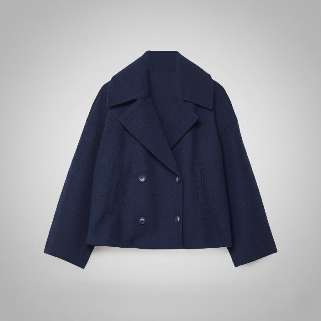 Classic women's short jacket with double buttons, tailored to perfection, offering timeless style.