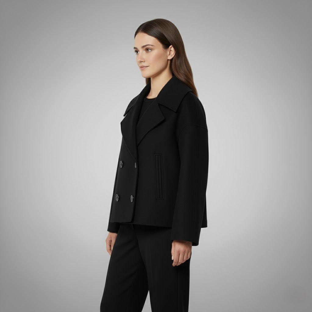 Tailored women's jacket, classic double button style, cropped for a chic and modern look.