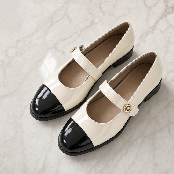Black patent Mary Jane flats for women, featuring arch support & wide toe box.