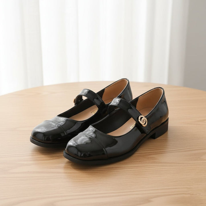 Patent finish women's Mary Jane flats, offering arch support & wide fit.