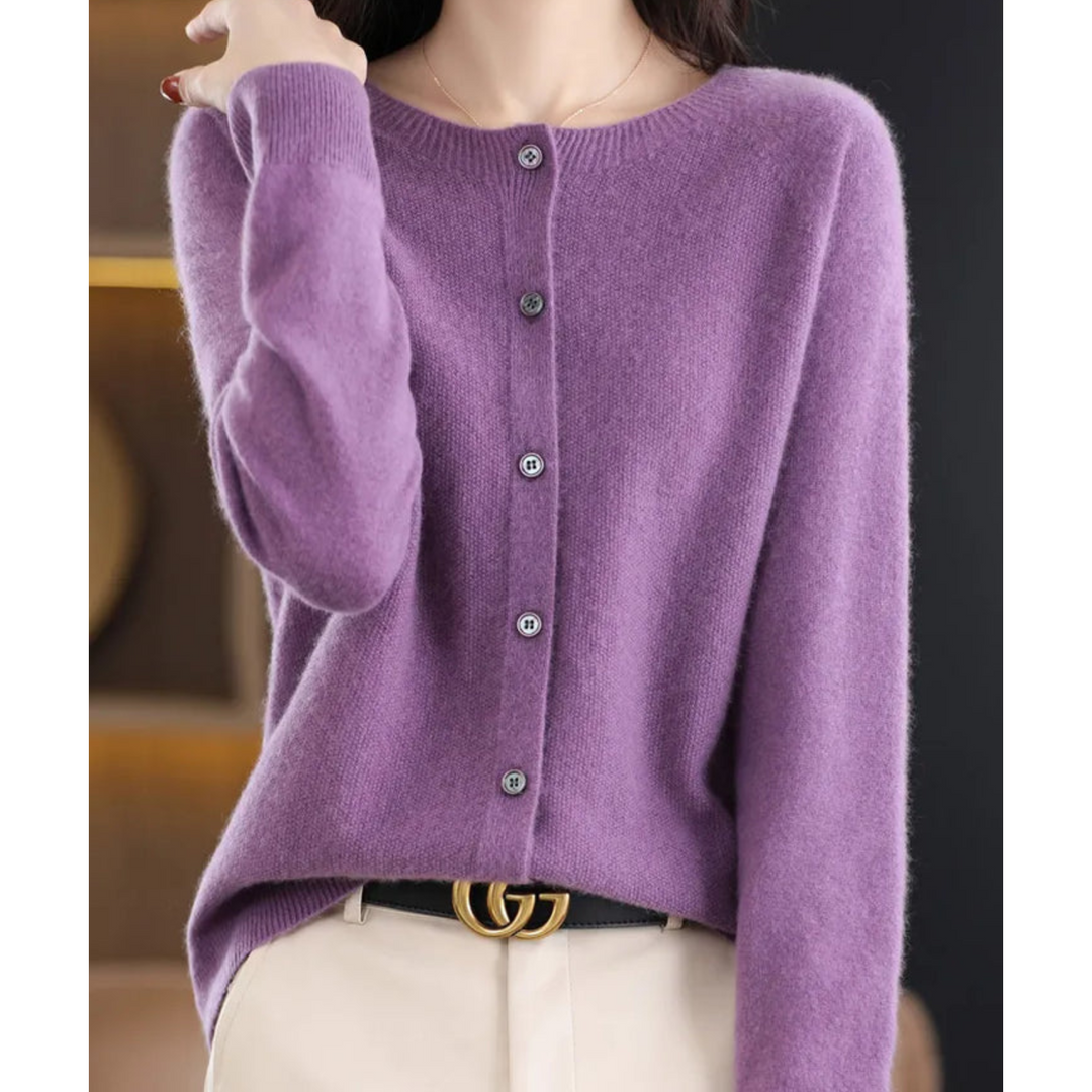 Versatile women's long sleeve merino wool sweater, buttoned front, perfect for layered winter looks.