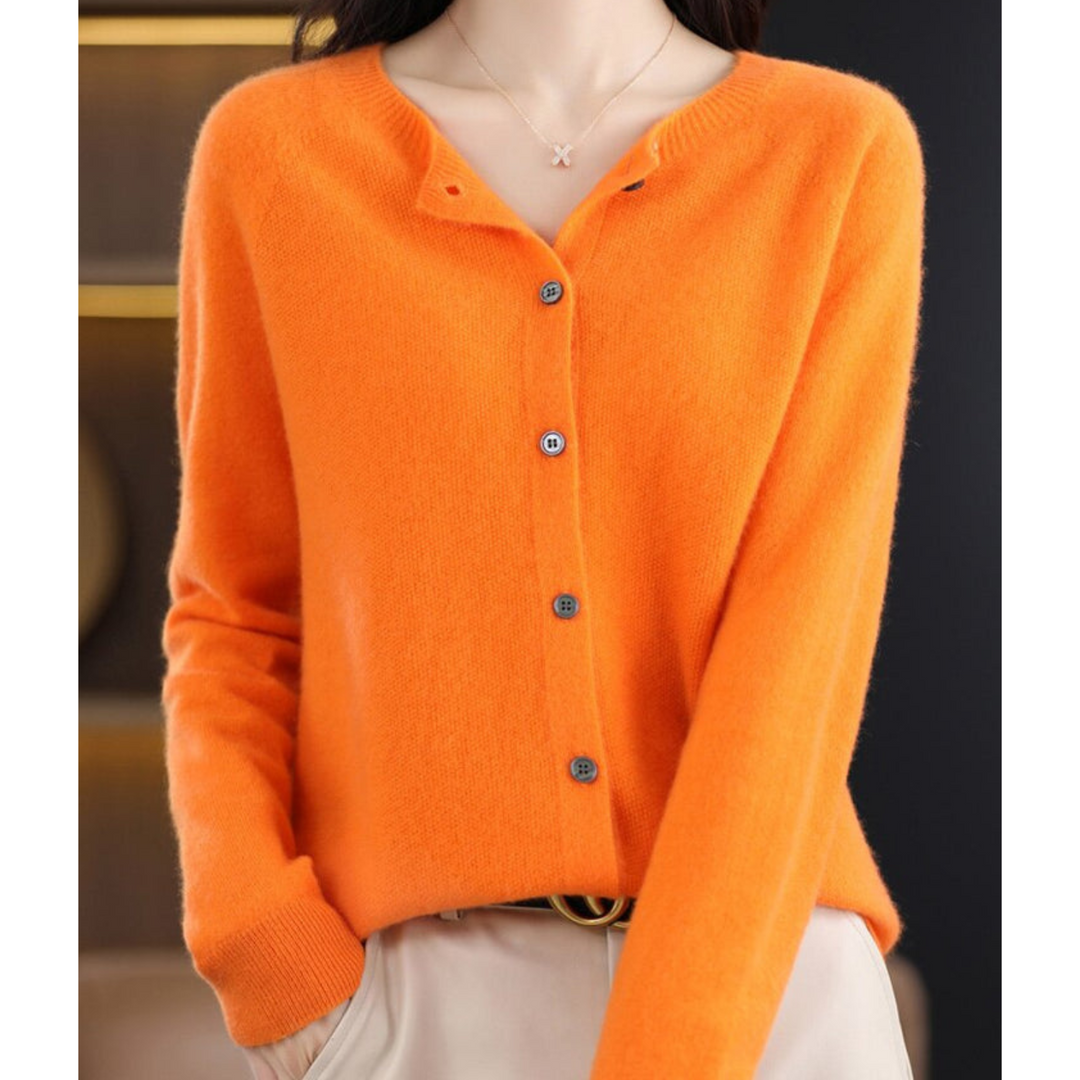 Fashionable women's sweater: merino wool, long sleeve, button-down, a timeless wardrobe essential.