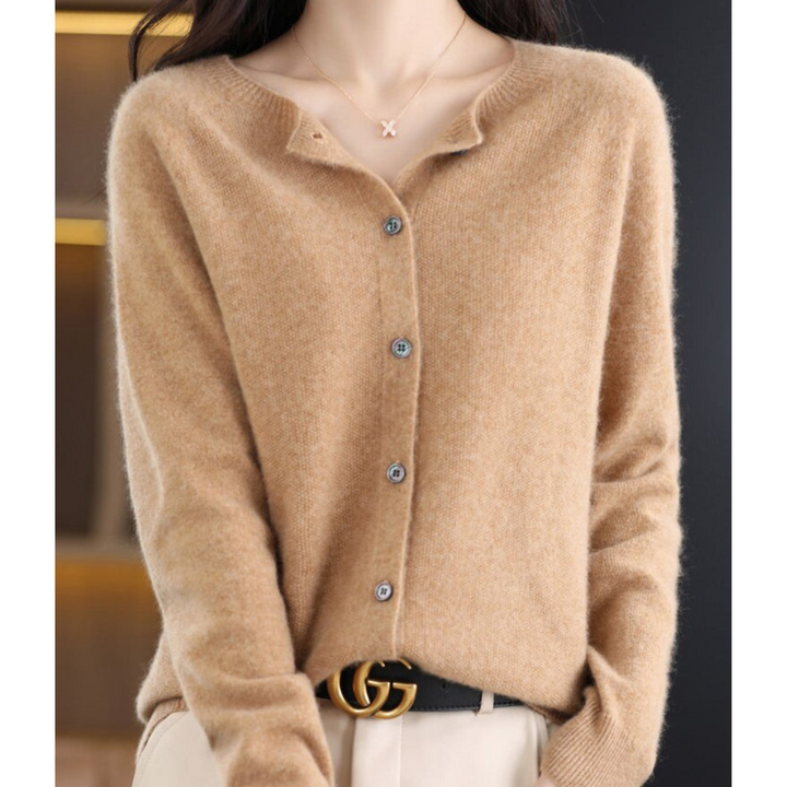 High-quality women's merino wool sweater with classic button front, offering softness and elegance.