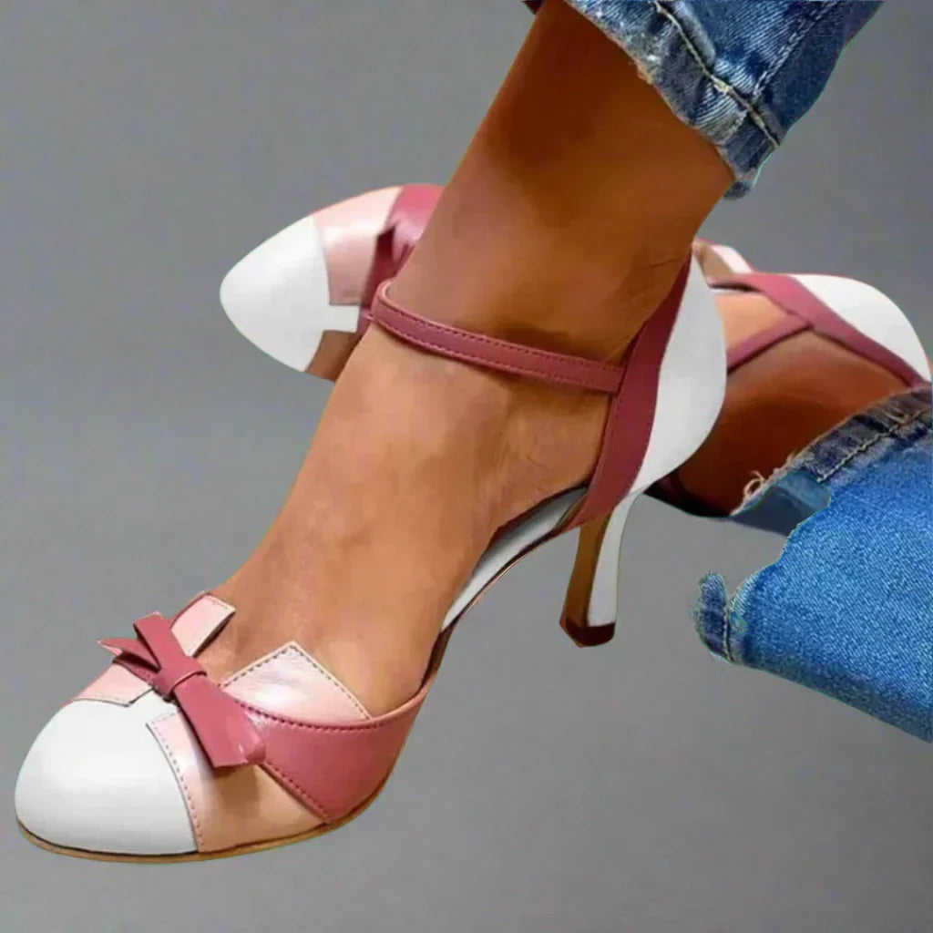 Classic women's dress pumps with a chic bow strap and comfortable mid-heel. Versatile for summer heels & formal wear.