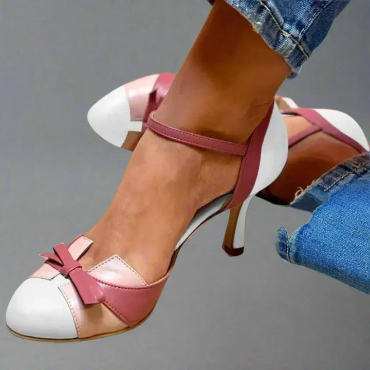 Classic women's dress pumps with a chic bow strap and comfortable mid-heel. Versatile for summer heels & formal wear.