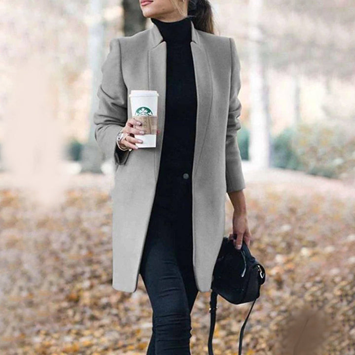 Grey women's classic tailored lapel winter coat, offering warmth and style for elegant outerwear.