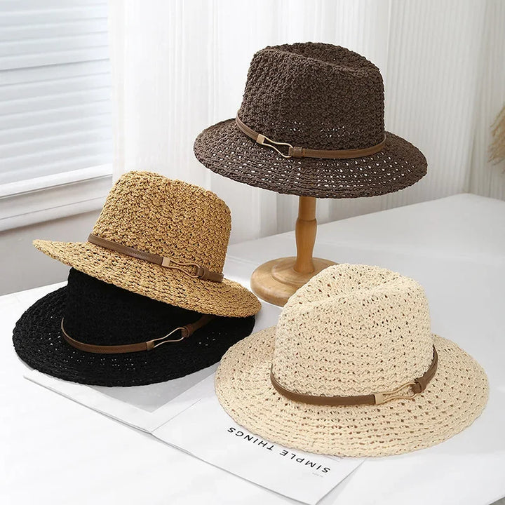 A women's woven fedora, merging classic style with a modern faux leather trim for outdoor wear.