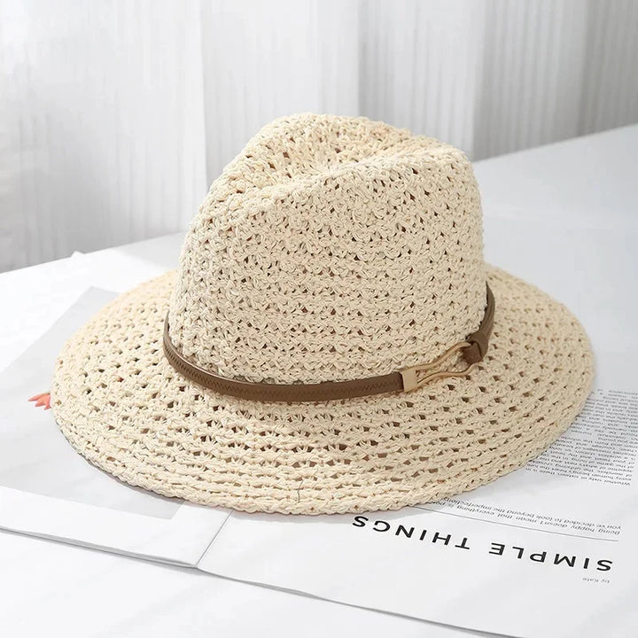 Detail of the woven texture on a women's classic fedora with its faux leather accent.