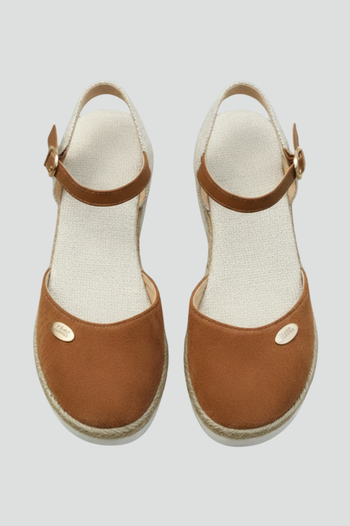 Women's closed-toe espadrille sandals with heel strap & platform sole for summer comfort & chic style.
