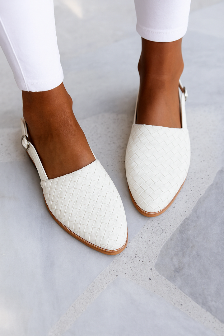 Fashionable & comfortable women's closed toe slip-on flat mules, essential versatile backless footwear.