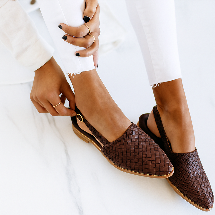 Stylish women's closed toe flat mules, perfect slip-on sandals for spring & summer casual outfits.