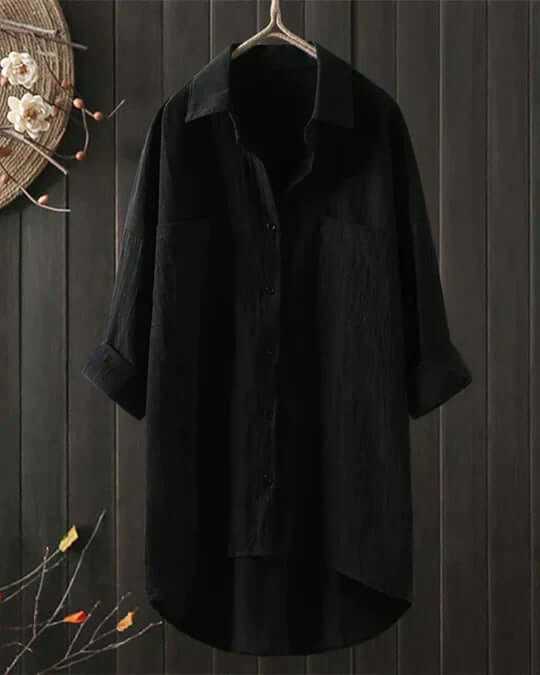 Versatile women's longline collared blouse, perfect for spring/summer with roll tab sleeves and a relaxed fit.