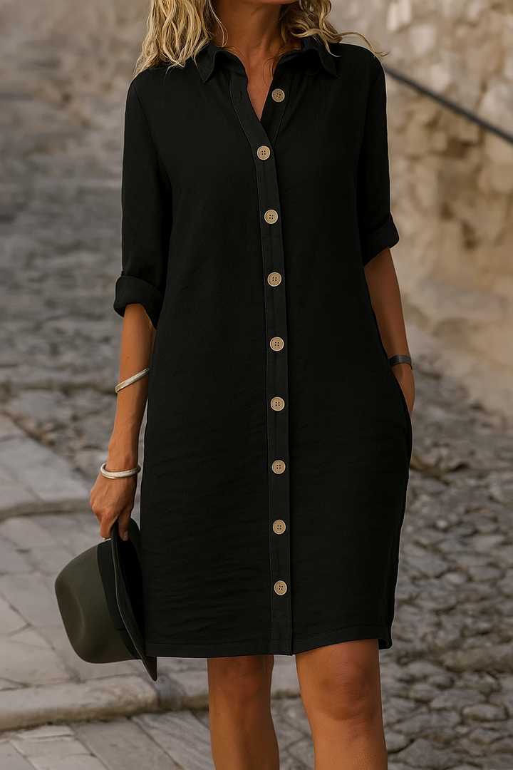 Elegant women's casual dress, collared, with functional roll-tab sleeve detail.