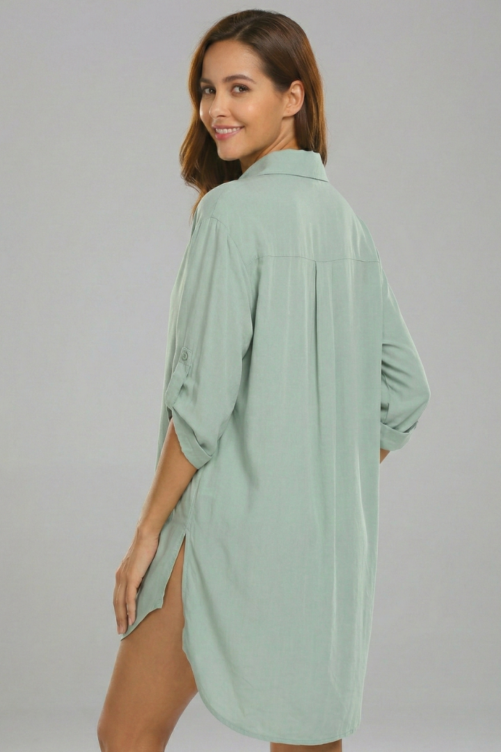 Stylish women's collared tunic dress, above knee length, with comfortable loose fit and practical long sleeves.