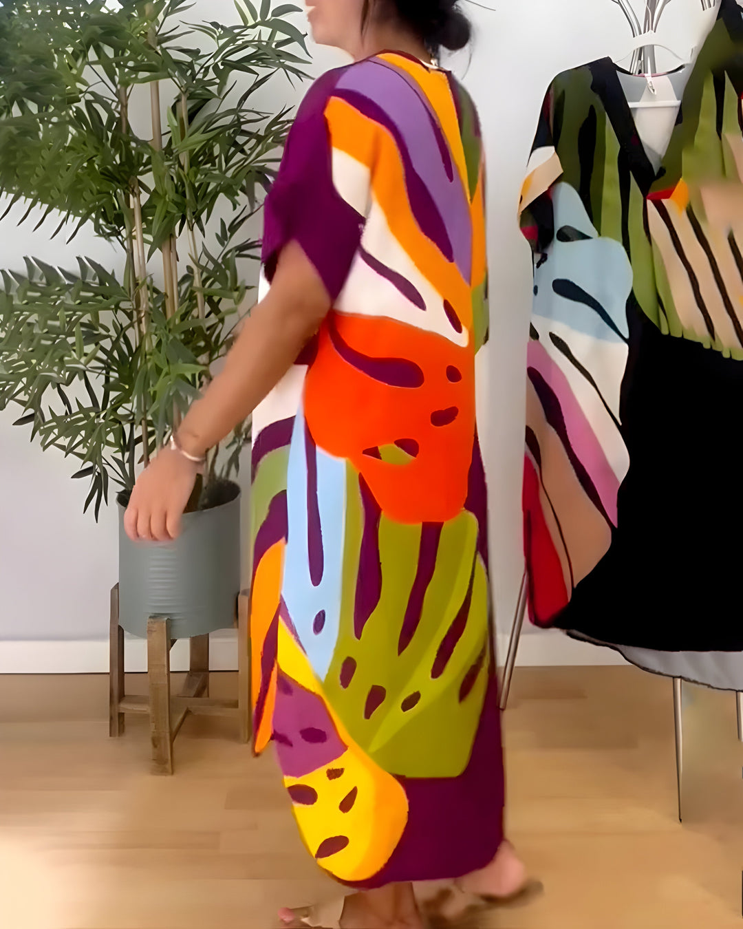 Summer-ready women's abstract print V-neck shift dress with short sleeves and a relaxed, breezy fit.