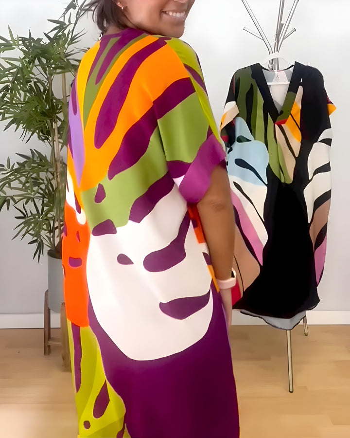 Women's short sleeve abstract print shift dress, V-neck, comfortable relaxed fit for casual outings.