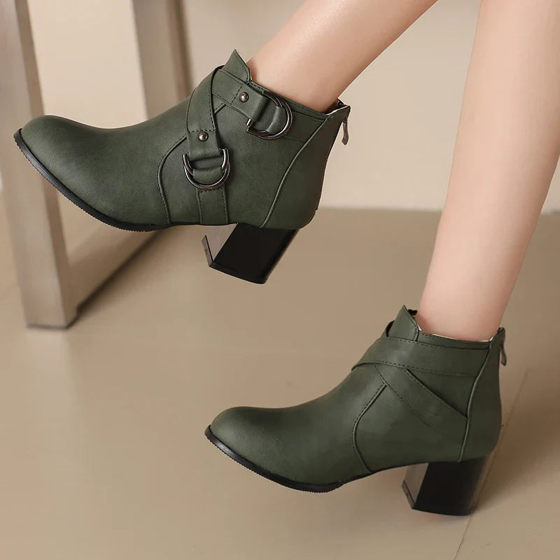Front view of women's comfort buckle ankle boot, sleek design for versatile wear