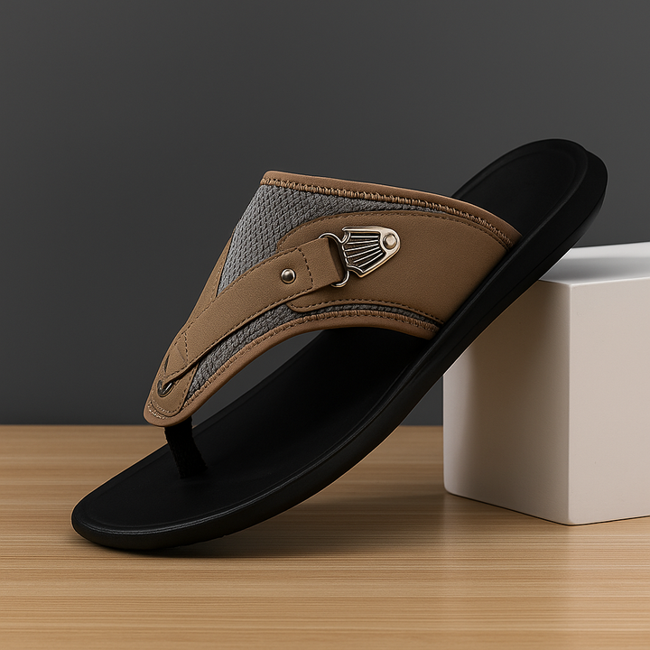 Pair of flat women's comfort sandals featuring buckles and a stylish leather detail for casual wear.