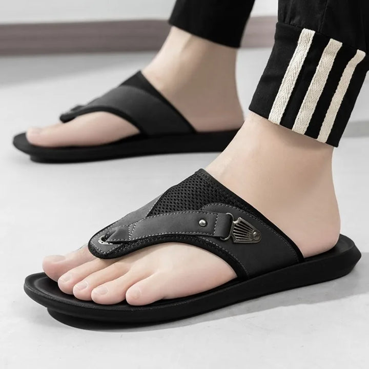 Stylish women's comfort sandals with prominent buckles and intricate leather detailing for summer.