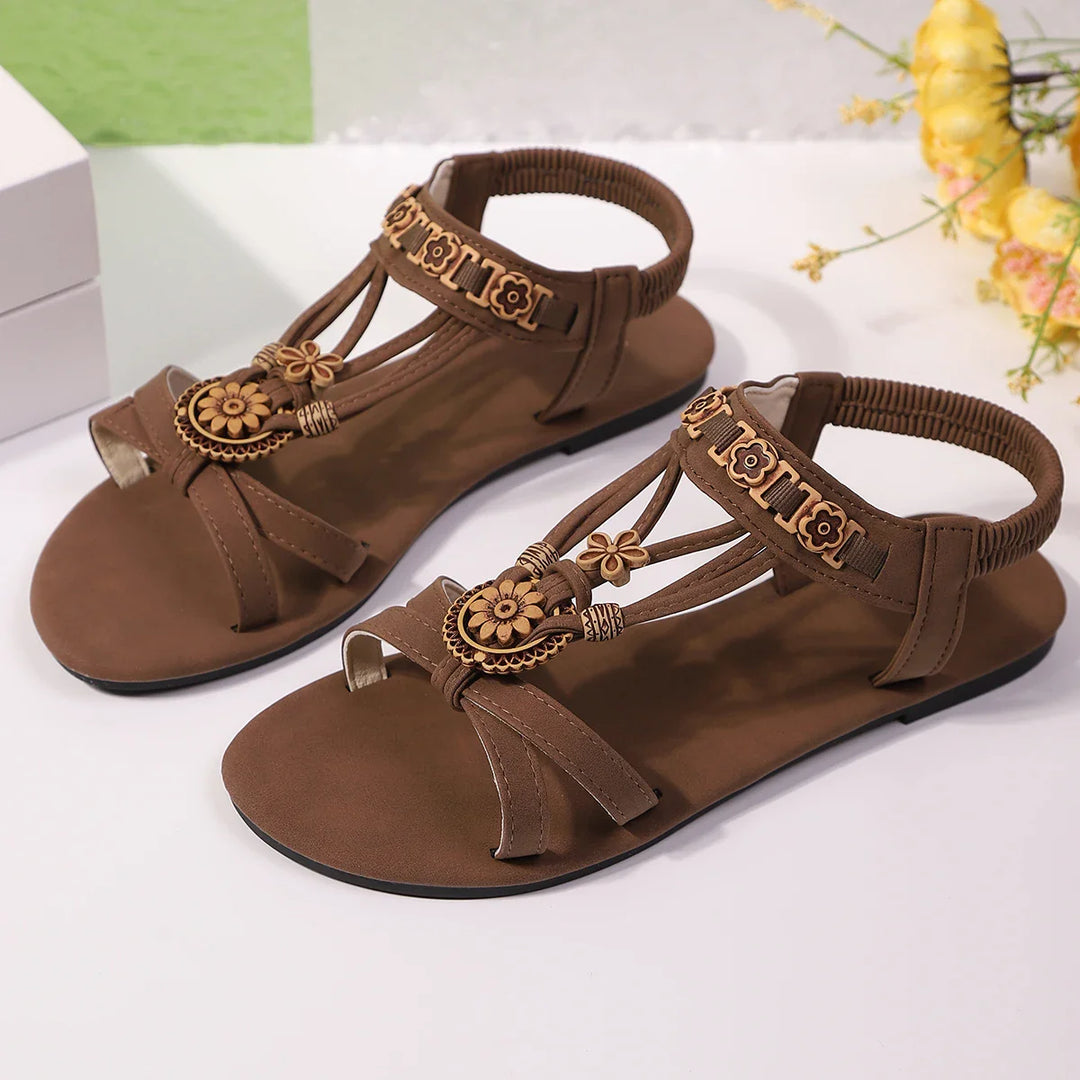 Elegant Women's Comfort Slip-On Sandals, beige with intricate floral detailing, casual summer footwear