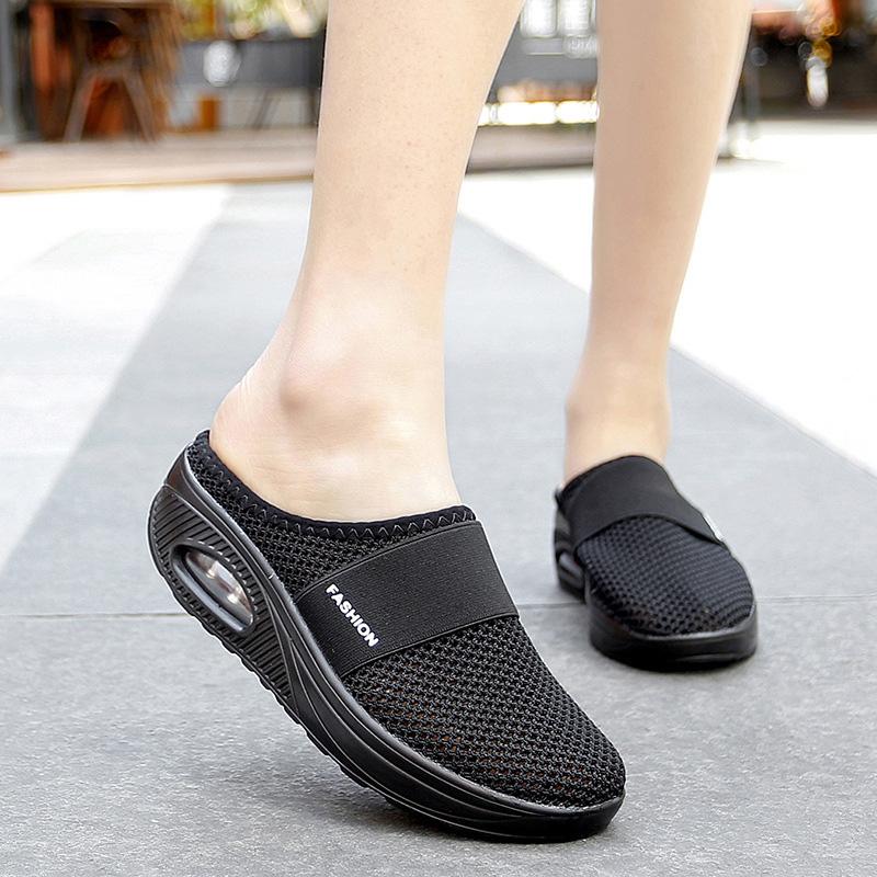 Close-up of women's mesh flat sandals, showing comfort footbed for orthopedic support