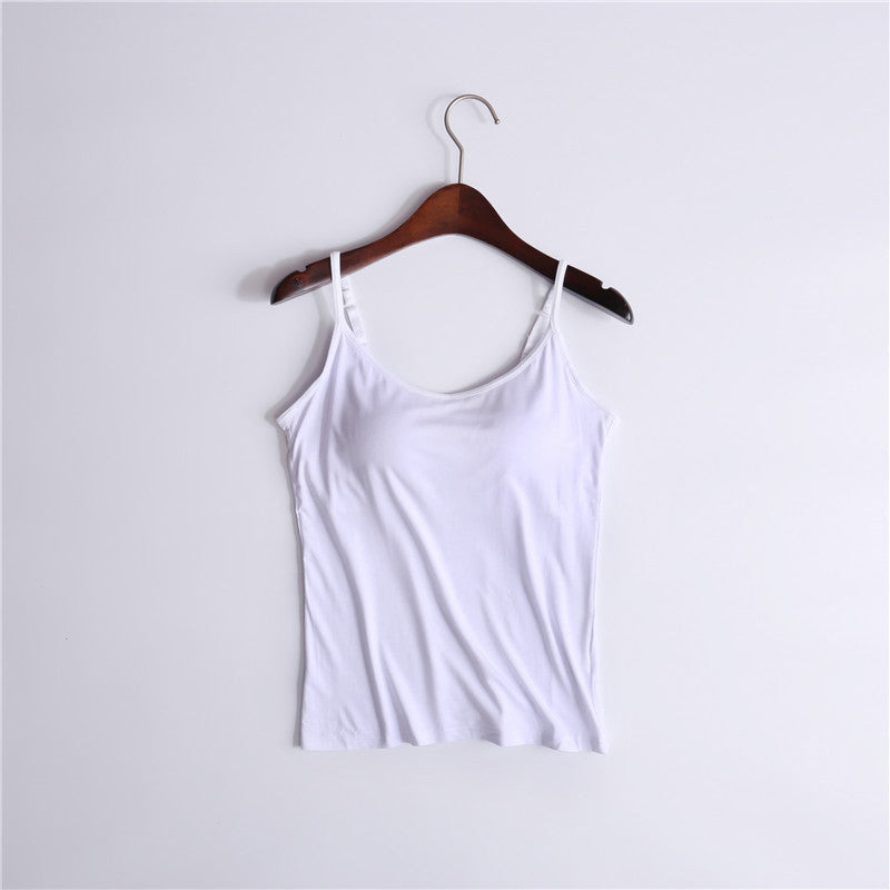 Women's white comfort tank top with built-in bra, layered under an open shirt for casual look