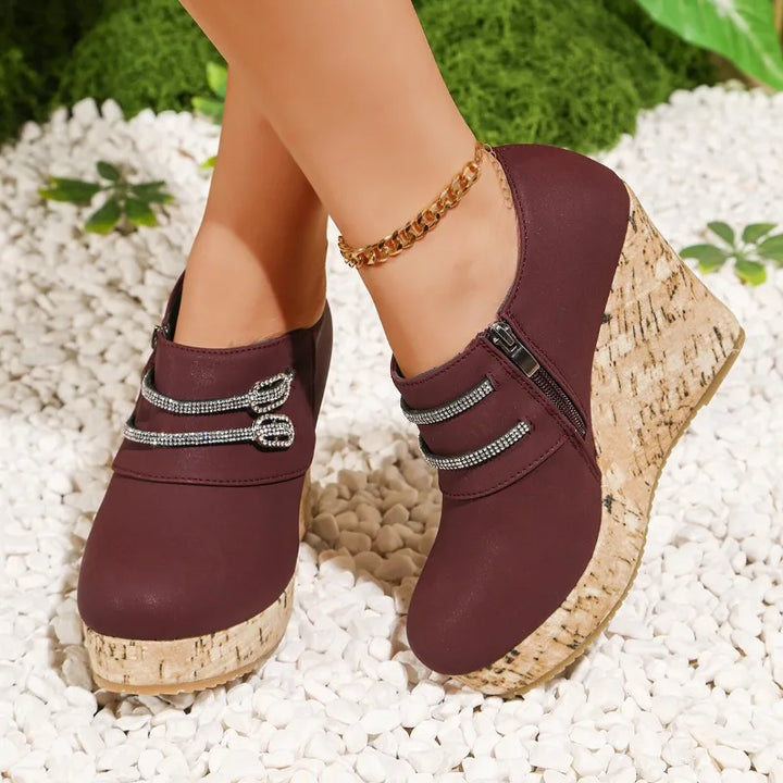 Dressy women's comfort wedge sandals with a matte finish, sparkling crystals, and supportive cork sole.