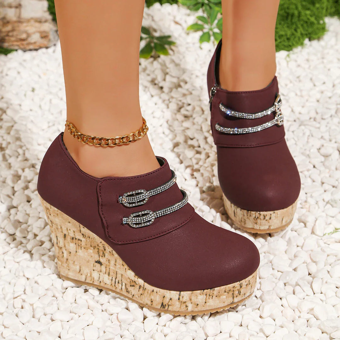 Women's comfort footwear: wedge heel sandals with a cork sole and elegant crystal embellishments for dress.