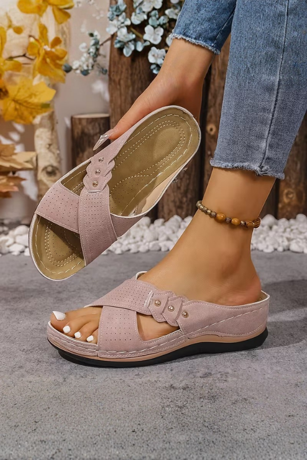 Women's wedge slip-on sandals, perforated upper for breathability & comfort. Casual summer footwear, perfect for travel.
