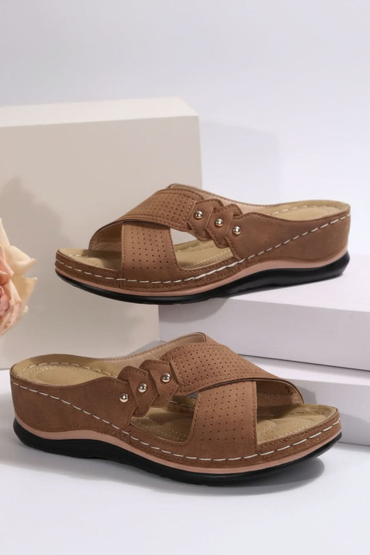 Women's stylish perforated comfort wedge slip-on sandals, perfect for summer, vacation, and everyday casual wear.
