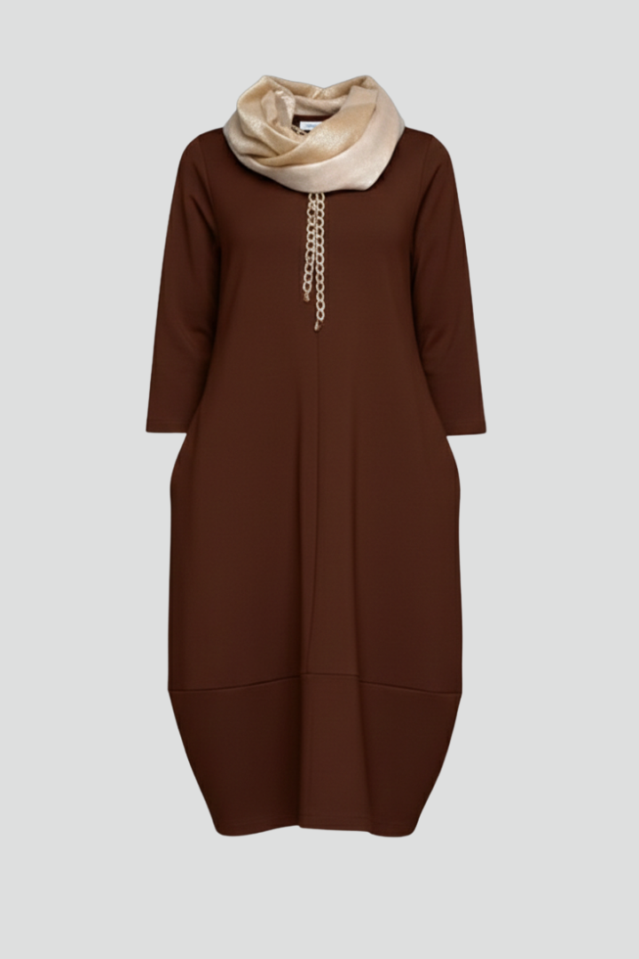 Women's comfortable A-line midi dress with 3/4 sleeves & practical pockets, perfect for casual elegance.