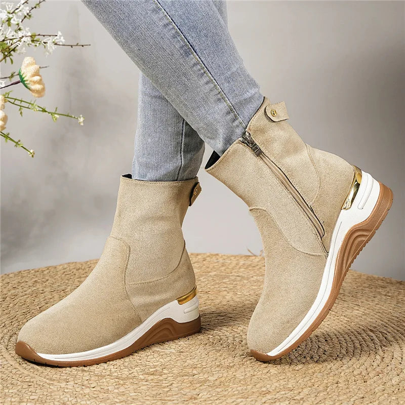 Front view of women's zip-up ankle boots, combining style with essential orthopedic support.