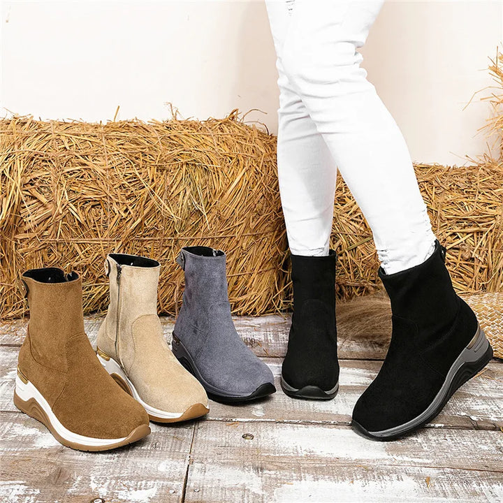 Women's comfortable ankle boots with a non-slip outsole, built for everyday wear and stability.