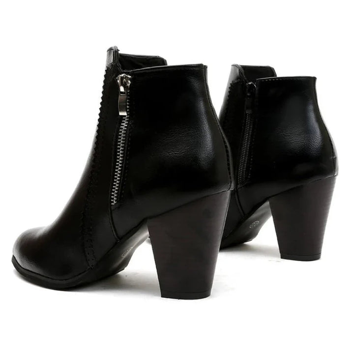 Women's ankle boots in multiple colors, all featuring a scalloped edge and side zip for easy, comfortable wear.