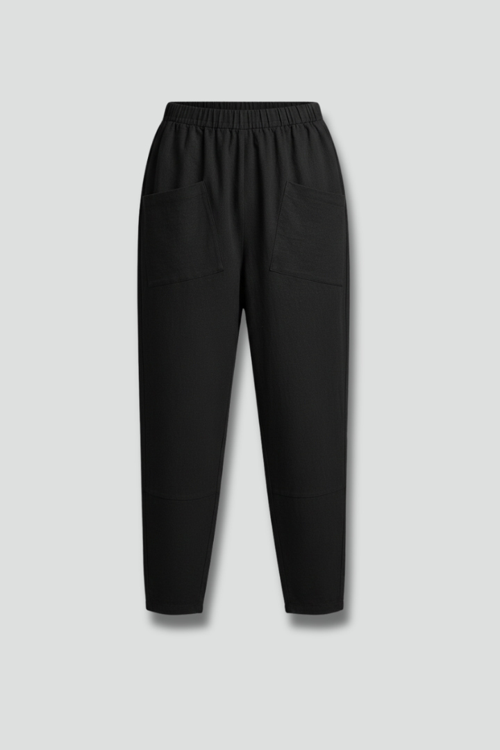 Women's comfortable ankle trousers with elastic waist and practical side pockets, perfect for everyday wear.