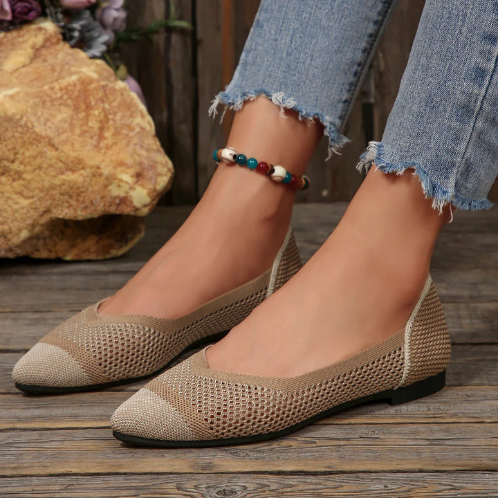 Fashionable purple knit pointed toe flats for women, combining style with supreme comfort.