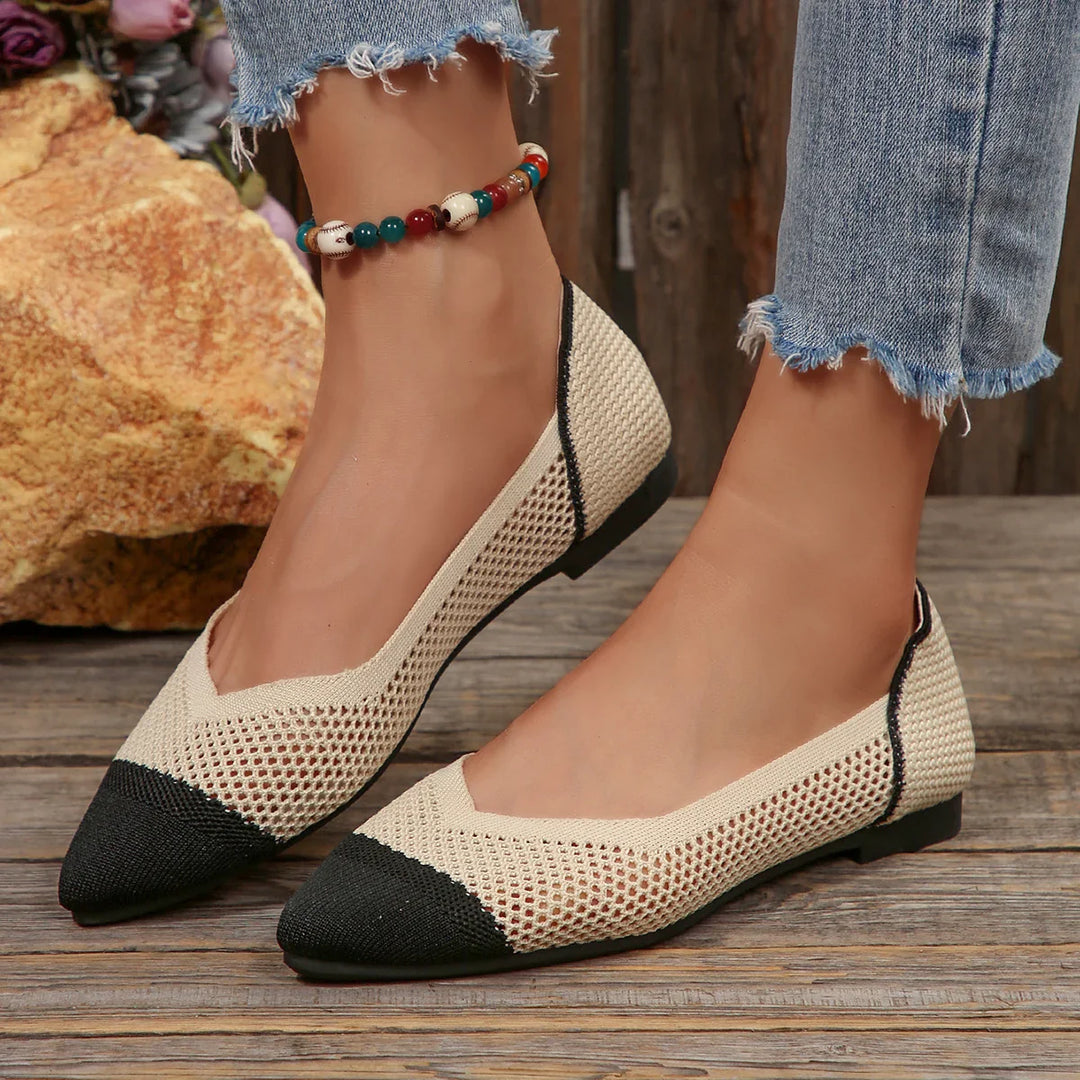 Detailed shot of the flexible sole on women's knit pointed toe flats, ensuring comfort and durability.