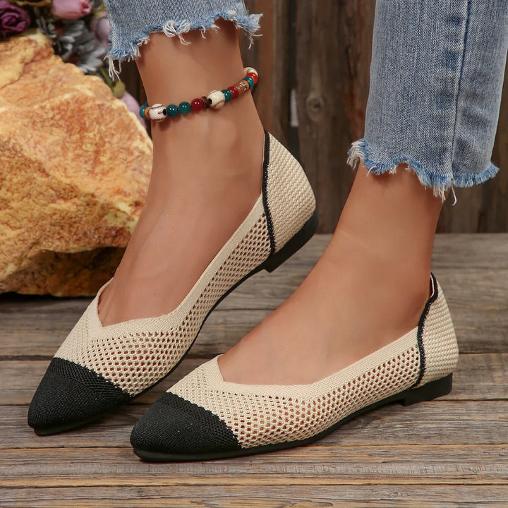 Detailed shot of the flexible sole on women's knit pointed toe flats, ensuring comfort and durability.