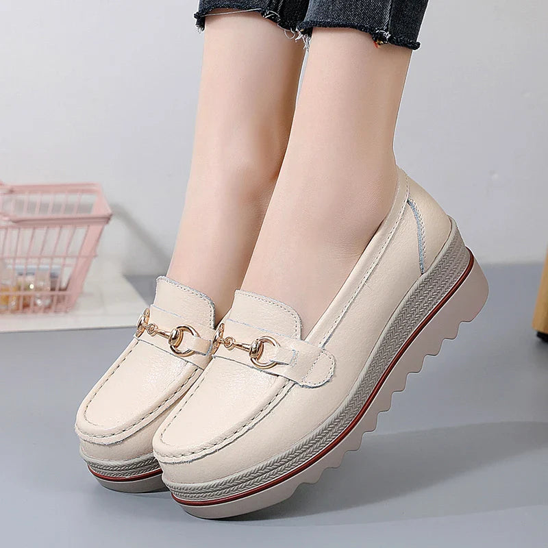 Trendy women's black platform loafers, chain embellished and highly comfortable