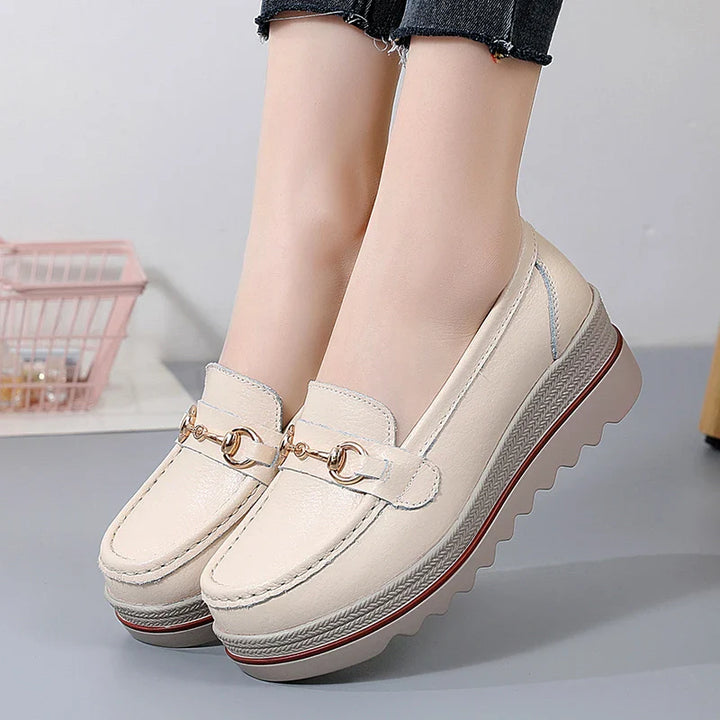 Trendy women's black platform loafers, chain embellished and highly comfortable