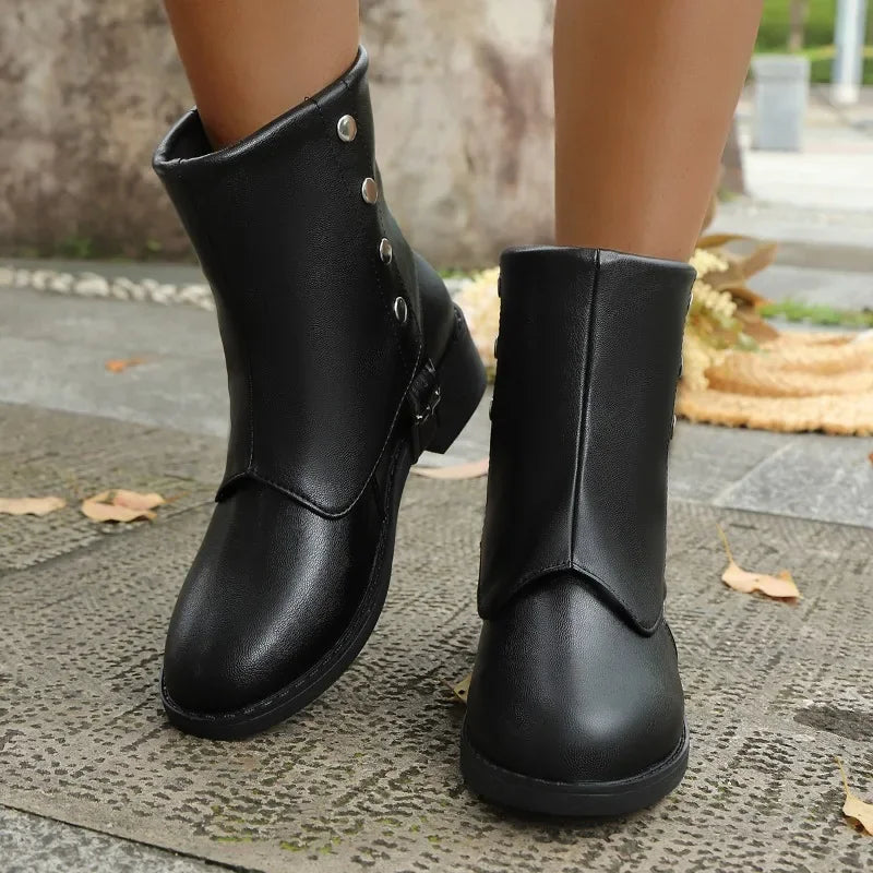 Comfortable women's ankle boots made from durable vegan leather, suitable for various casual occasions.
