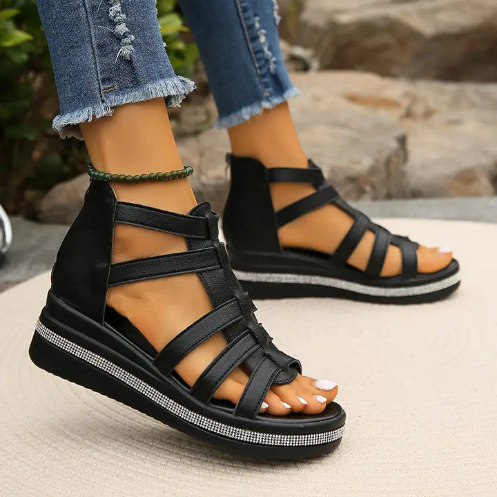 Close-up of comfortable wedge sandals for women, highlighting soft materials & daily style.