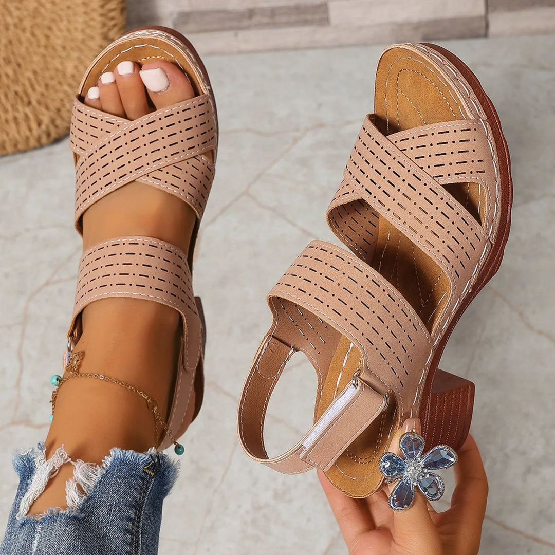 Stylish and comfortable women's block heel sandals with an intricate crisscross strap pattern